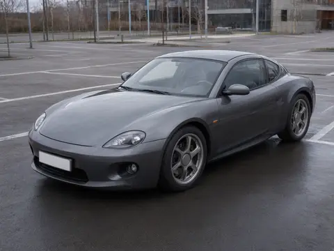 Side profile photo of the car